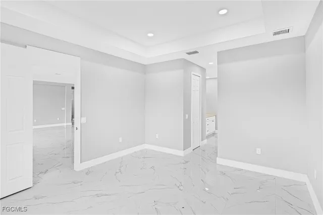 a bathroom with a double vanity sink mirror and