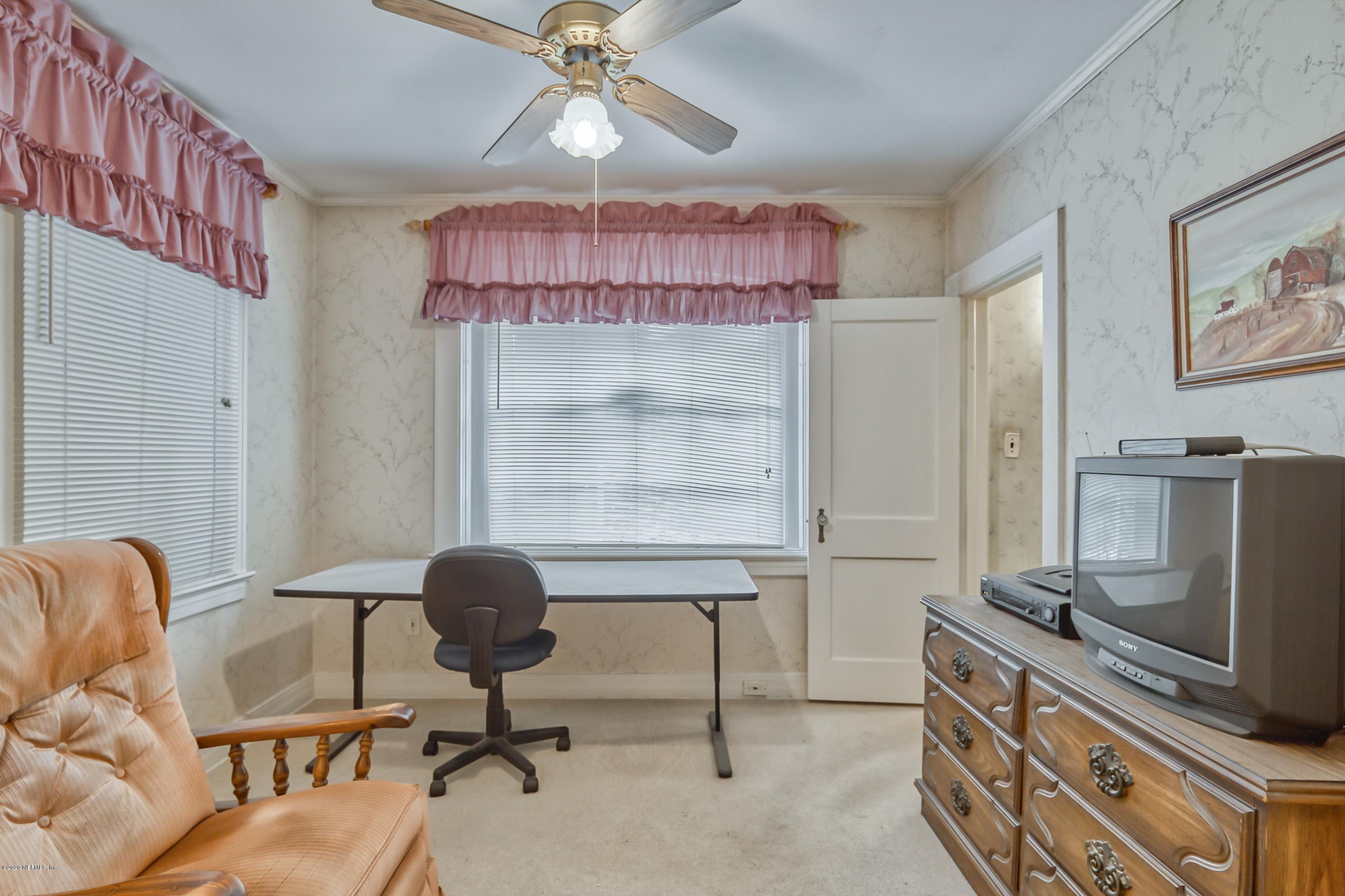1011 Inwood Terrace Jacksonville, FL 32207 - Photo 16 of 21 a view of a workspace with furniture and a window