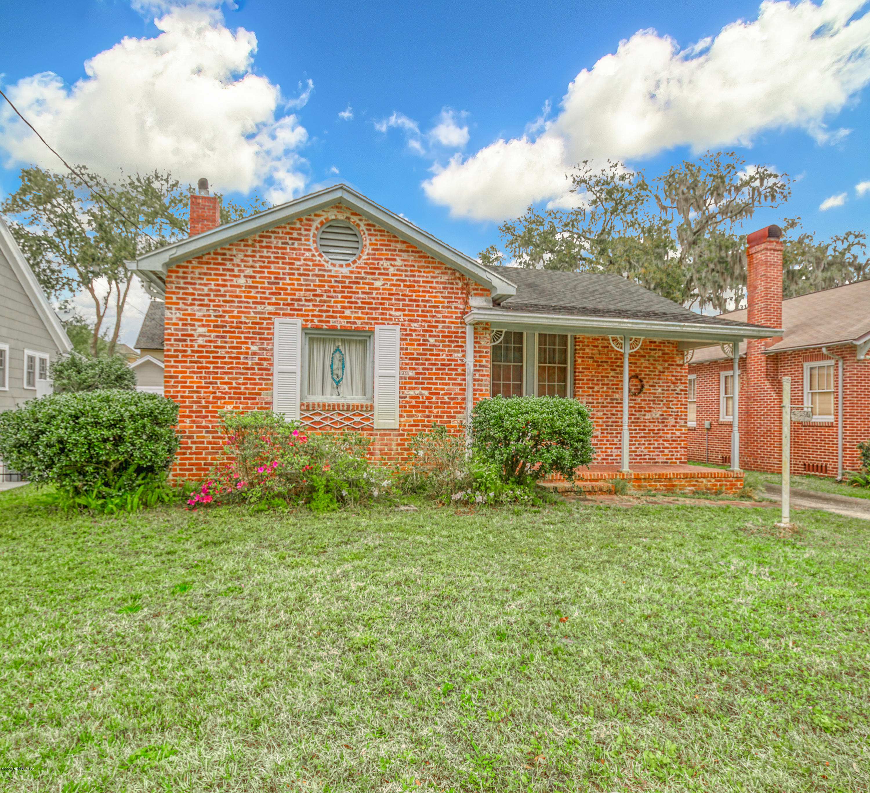 1011 Inwood Terrace Jacksonville, FL 32207 - Photo 18 of 21 a front view of a house with a yard
