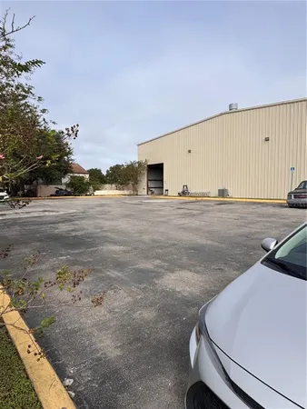 swimming pool view with wooden fencing