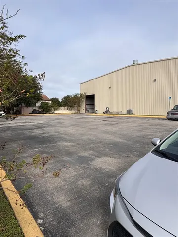 swimming pool view with wooden fencing
