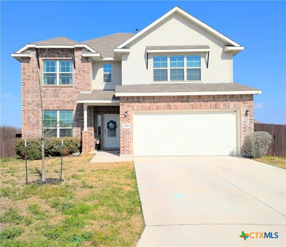 a view of a house with a outdoor space