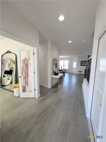a view of a living room a couch and a stove