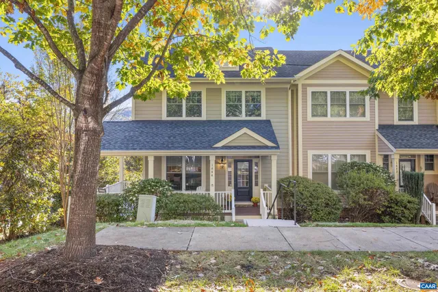 a front view of a house with yard