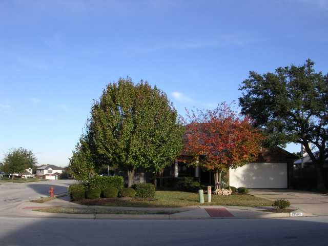 13500 Dulles Avenue Austin, TX 78729 - Photo 1 of 1 a view of street with houses