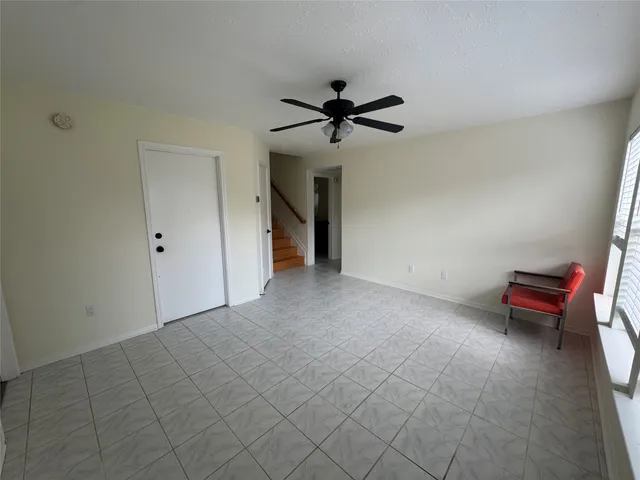 a view of a livingroom with a furniture