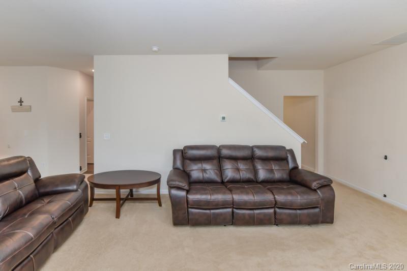 6565 Paw Village Road Charlotte, NC 28214 - Photo 20 of 26 a living room with furniture