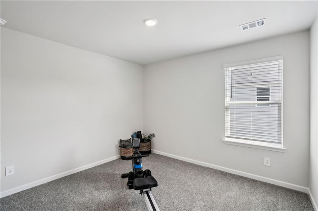 202 Proust Circle Dallas, GA 30132 - Photo 24 of 47 a view of workspace with a window