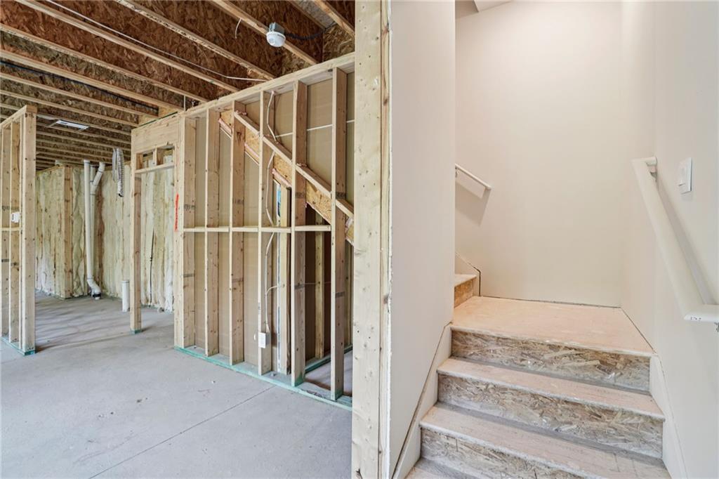 202 Proust Circle Dallas, GA 30132 - Photo 36 of 47 a view of staircase with white walls and a window
