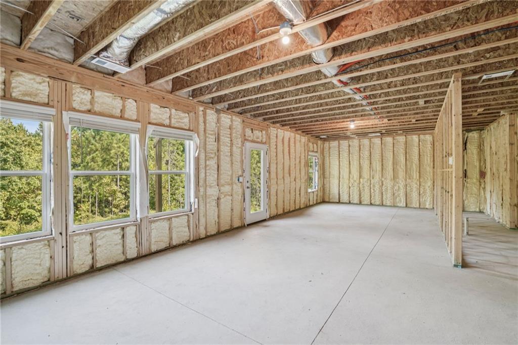 202 Proust Circle Dallas, GA 30132 - Photo 37 of 47 a view of an empty room with a sliding door