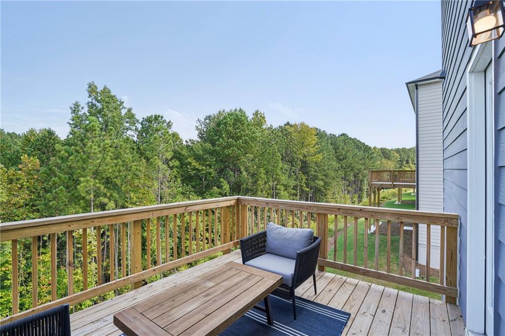 202 Proust Circle Dallas, GA 30132 - Photo 41 of 47 a view of a two chairs in the balcony