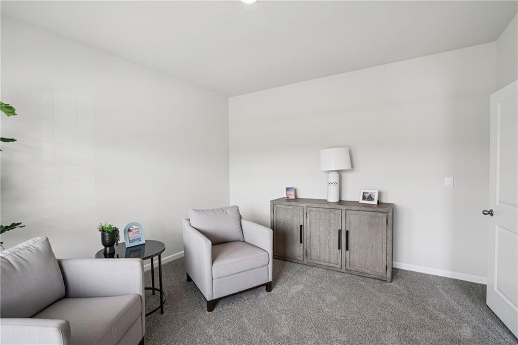 202 Proust Circle Dallas, GA 30132 - Photo 5 of 47 a living room with furniture a sink and a window