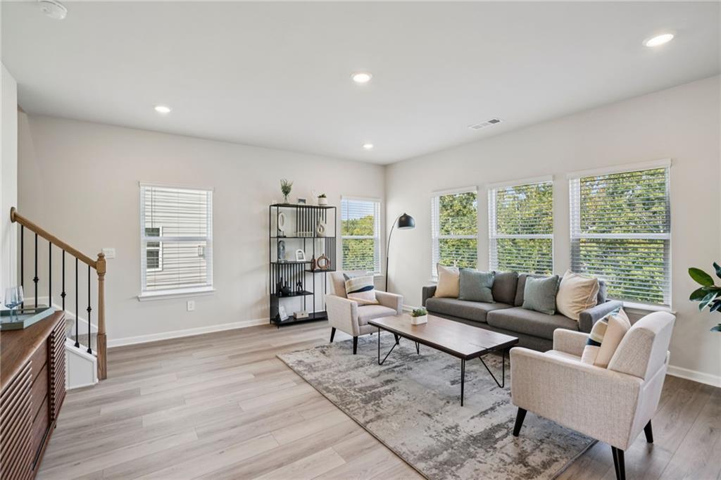 202 Proust Circle Dallas, GA 30132 - Photo 7 of 47 a living room with furniture and a window
