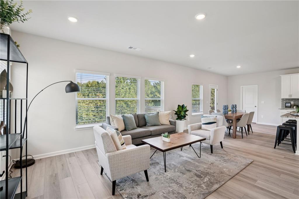 202 Proust Circle Dallas, GA 30132 - Photo 8 of 47 a living room with furniture and a window