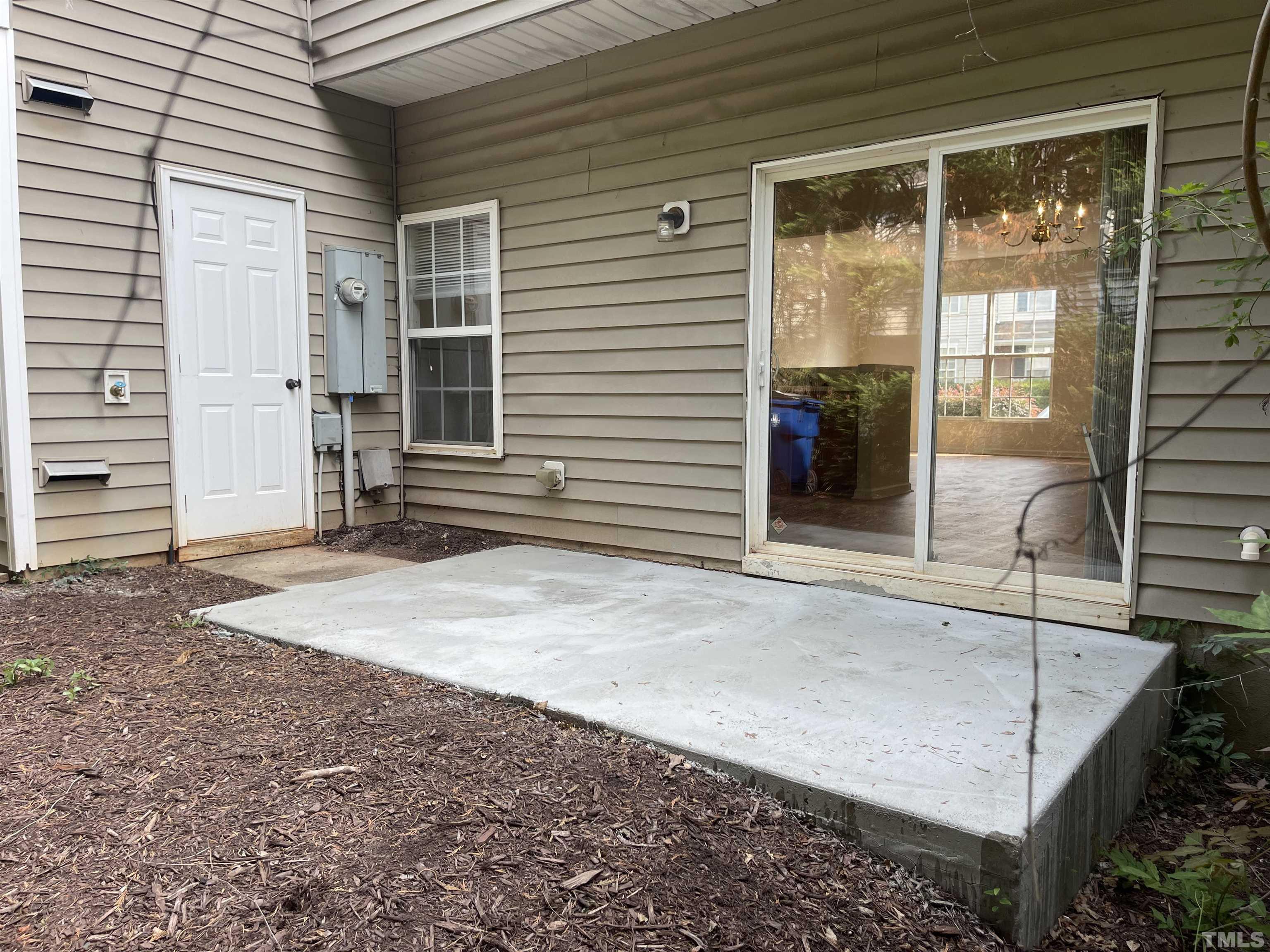 8521 Bright Loop Raleigh, NC 27613 - Photo 7 of 20 a view of a backyard of a house