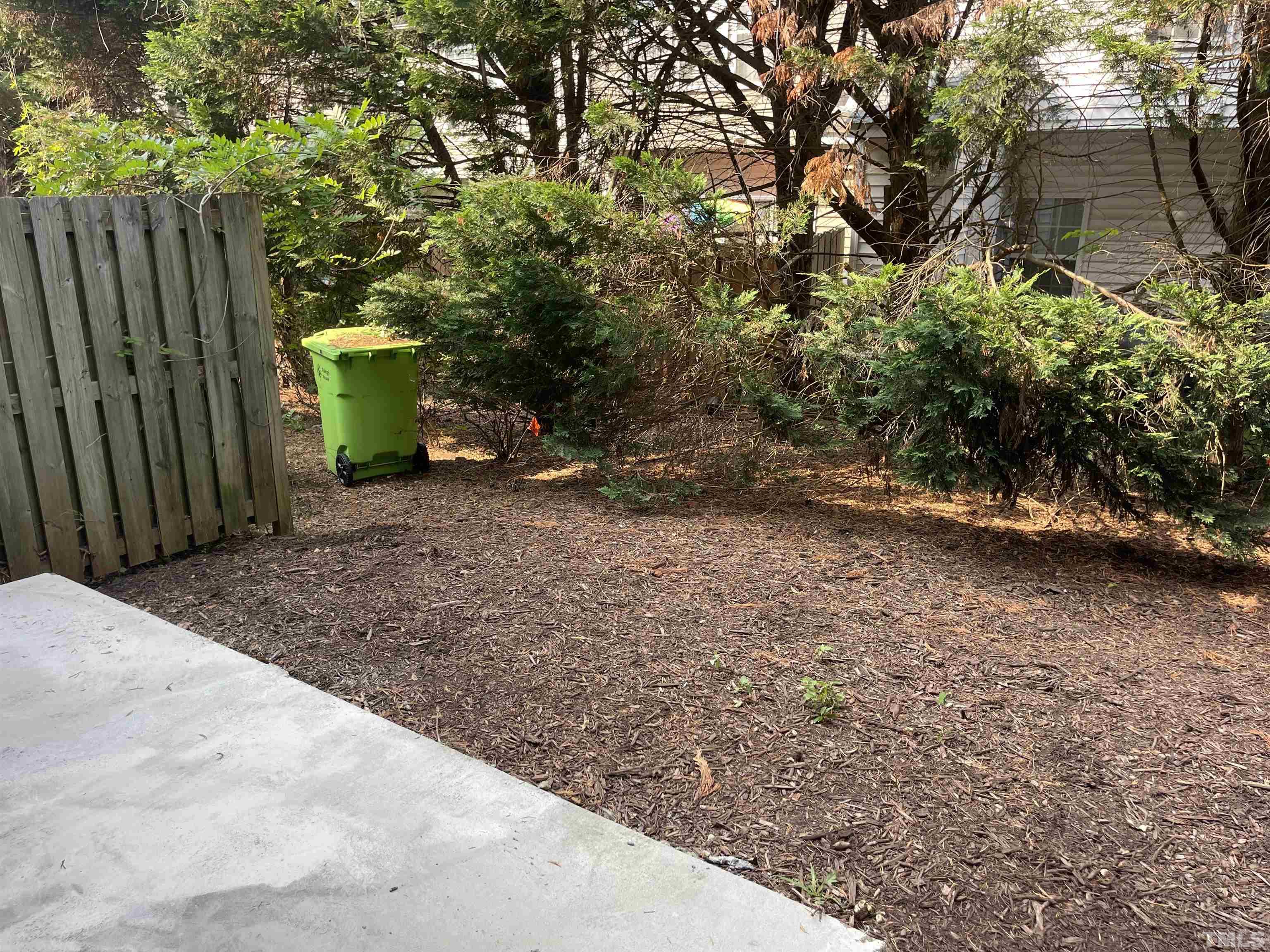 8521 Bright Loop Raleigh, NC 27613 - Photo 8 of 20 a view of backyard with green space