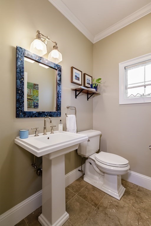 29 Old Bridge Road Concord, MA 01742 - Photo 16 of 37 a bathroom with a toilet sink and mirror