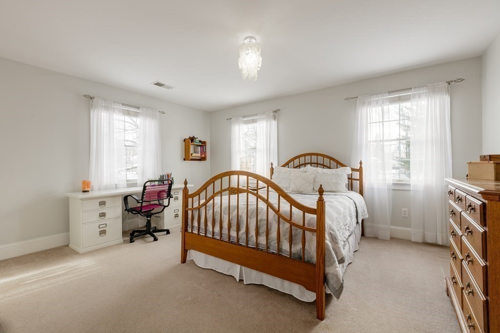29 Old Bridge Road Concord, MA 01742 - Photo 22 of 37 a bedroom with a bed and a window