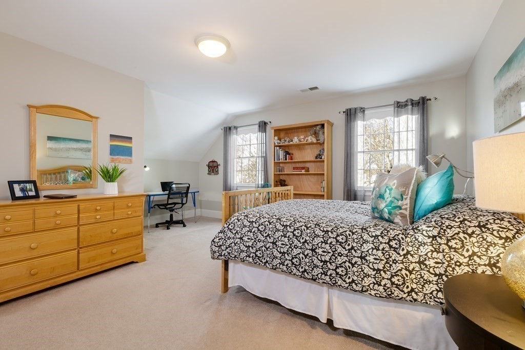 29 Old Bridge Road Concord, MA 01742 - Photo 24 of 37 a bedroom with a bed dresser and a window