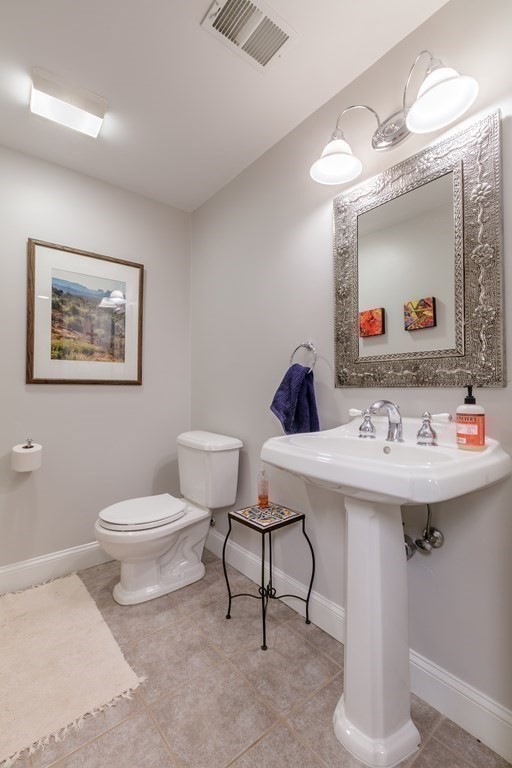 29 Old Bridge Road Concord, MA 01742 - Photo 28 of 37 a view of a bathroom with a sink and a mirror