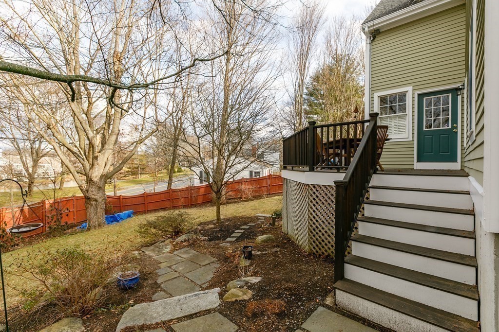 29 Old Bridge Road Concord, MA 01742 - Photo 31 of 37 a view of street with wooden fence and large trees
