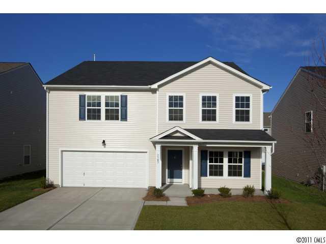 2183 Durand Road, Unit 84 Fort Mill, SC 29715 - Photo 1 of 16 a front view of a house with a yard