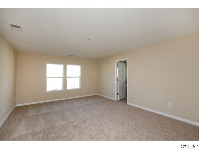 2183 Durand Road, Unit 84 Fort Mill, SC 29715 - Photo 11 of 16 an empty room with windows