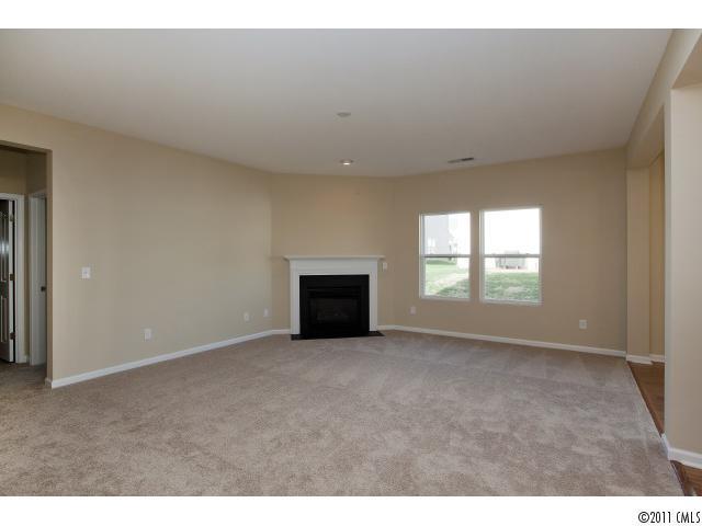 2183 Durand Road, Unit 84 Fort Mill, SC 29715 - Photo 4 of 16 a view of an empty room with a window