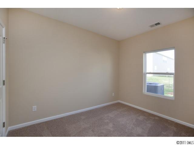 2183 Durand Road, Unit 84 Fort Mill, SC 29715 - Photo 9 of 16 an empty room with a window