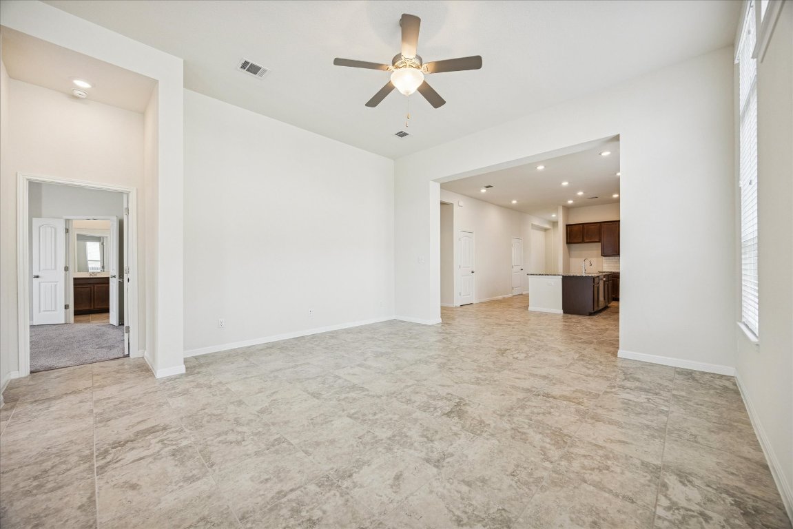 19201 Quebrada Drive Pflugerville, TX 78660 - Photo 11 of 22 en view interior of a house and an empty room