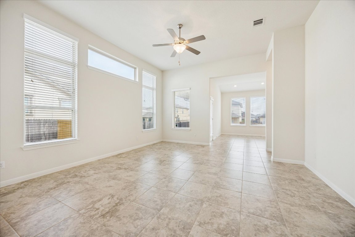 19201 Quebrada Drive Pflugerville, TX 78660 - Photo 9 of 22 a view of an empty room with a window