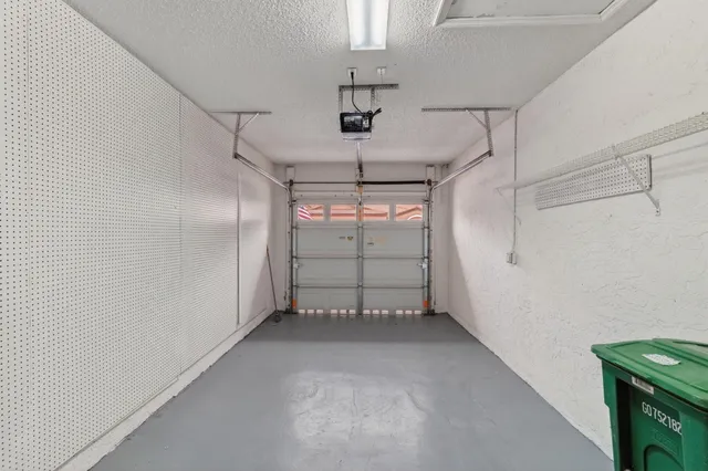 a view of a room that has a large window