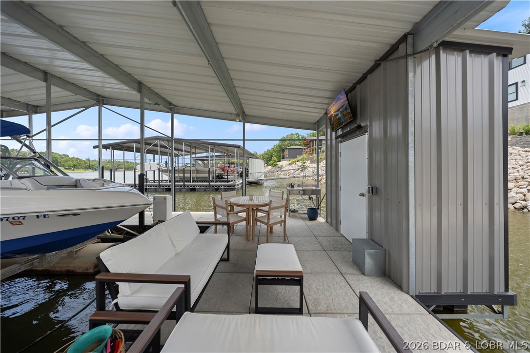 1151 Oak Road Osage Beach, MO 65065 - Photo 56 of 63 Covered dock featuring ample entertaining space an