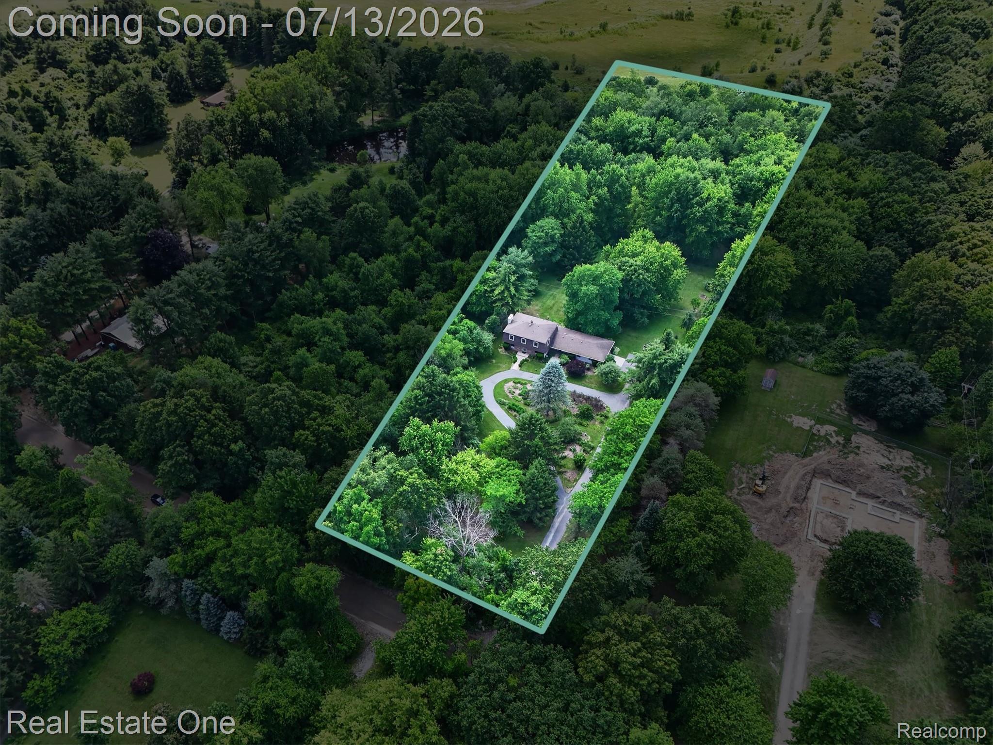 6039 Fish Lake Road Holly, MI 48442 - Photo 56 of 70 home sits on 3.30acres with the additional 3.30 acres to the left