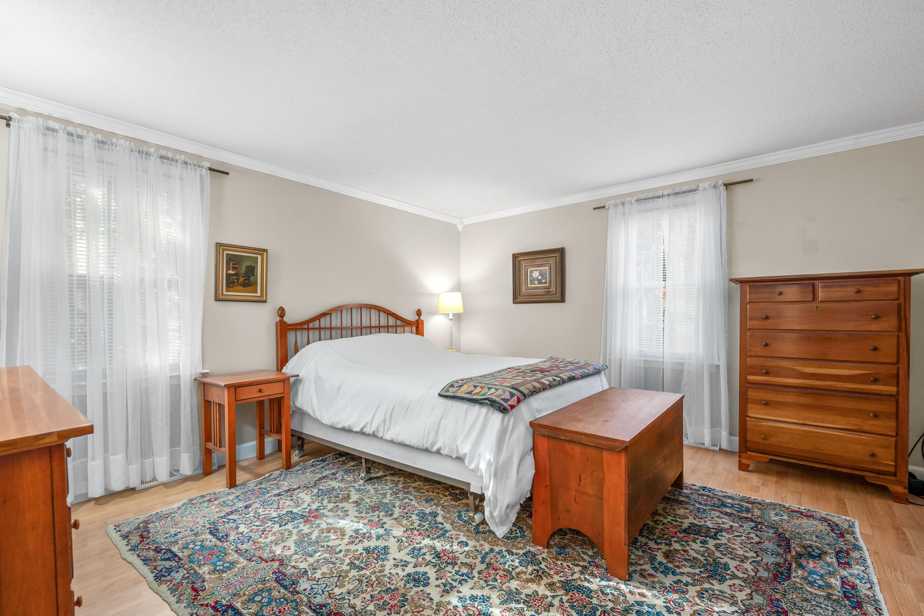 43 Chipman Road Sandwich, MA 02563 - Photo 17 of 35 a bedroom with a bed and a dresser