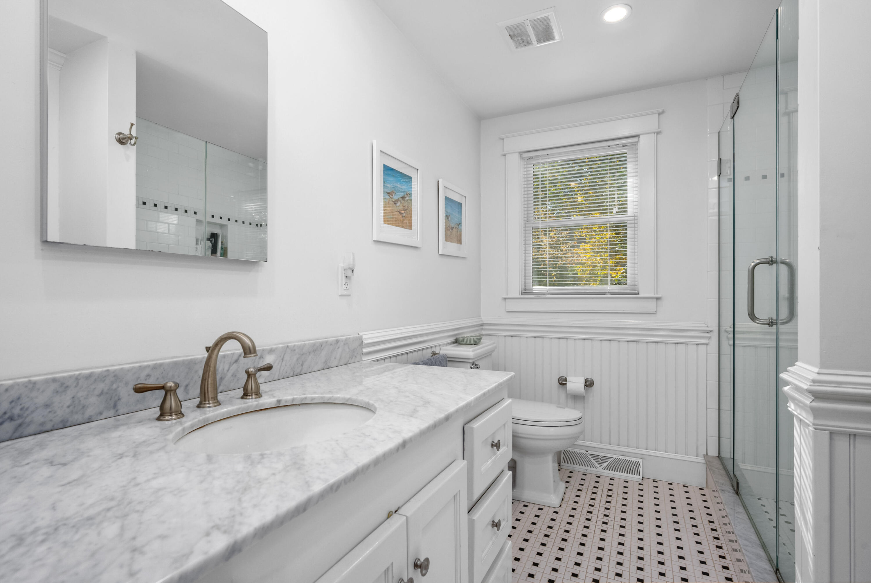 43 Chipman Road Sandwich, MA 02563 - Photo 20 of 35 a bathroom with a sink toilet and a window