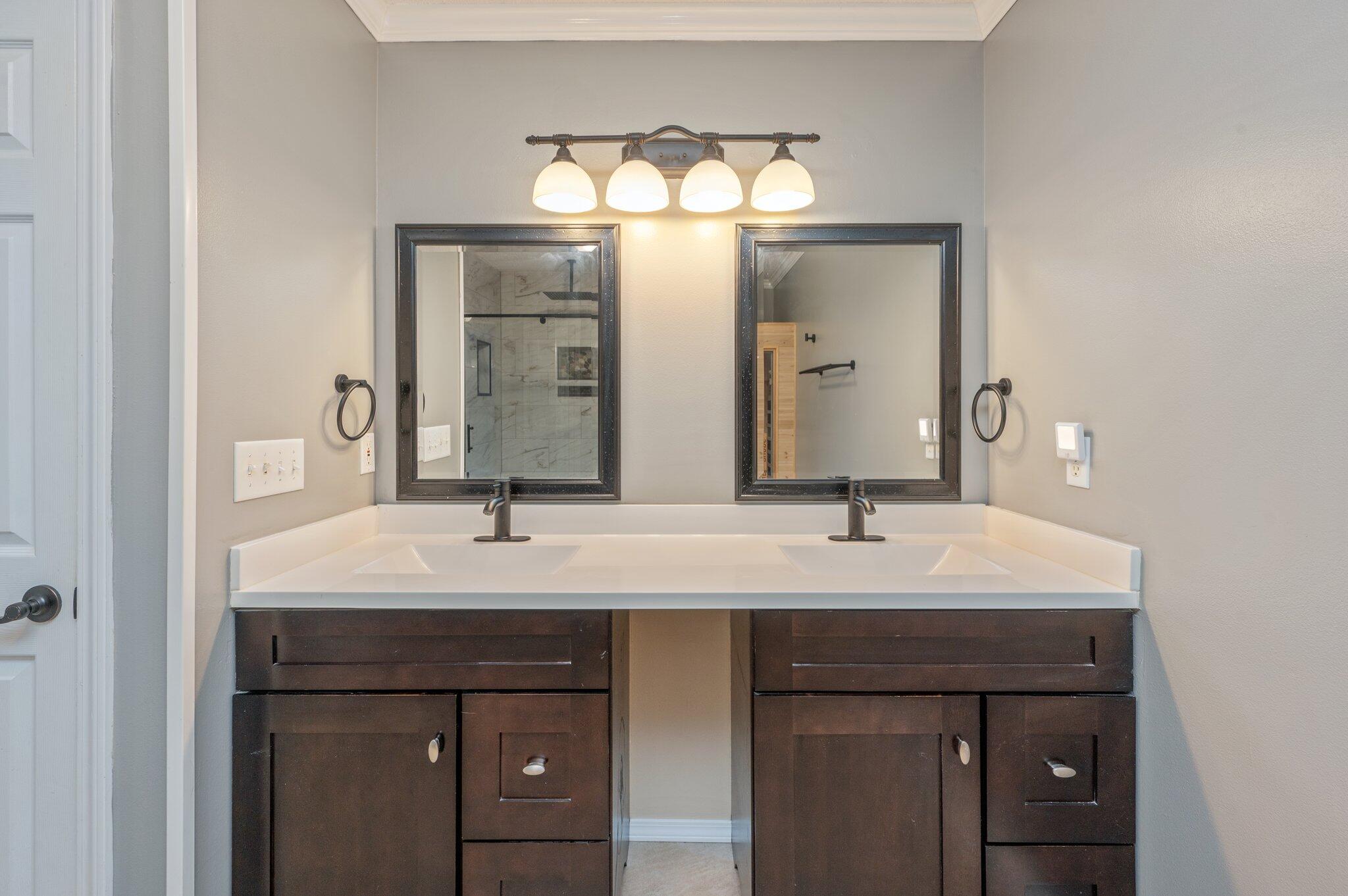 695 Randall Roberts Road Fort Walton Beach, FL 32547 - Photo 24 of 40 a bathroom with a sink and a mirror