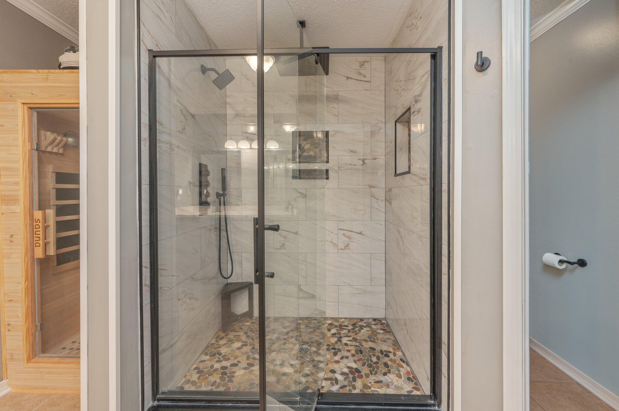 695 Randall Roberts Road Fort Walton Beach, FL 32547 - Photo 26 of 40 a bathroom with a glass shower door