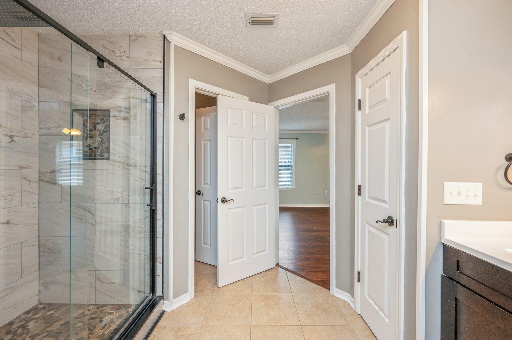 695 Randall Roberts Road Fort Walton Beach, FL 32547 - Photo 28 of 40 a view of a bathroom from a hallway