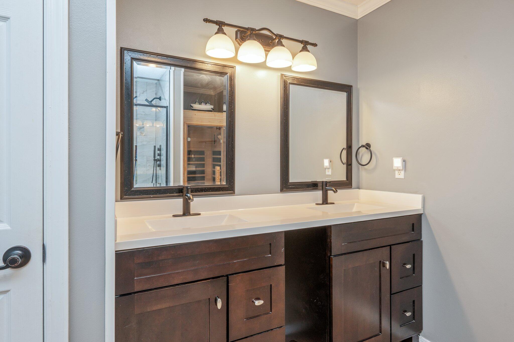 695 Randall Roberts Road Fort Walton Beach, FL 32547 - Photo 29 of 40 a bathroom with a sink and a mirror
