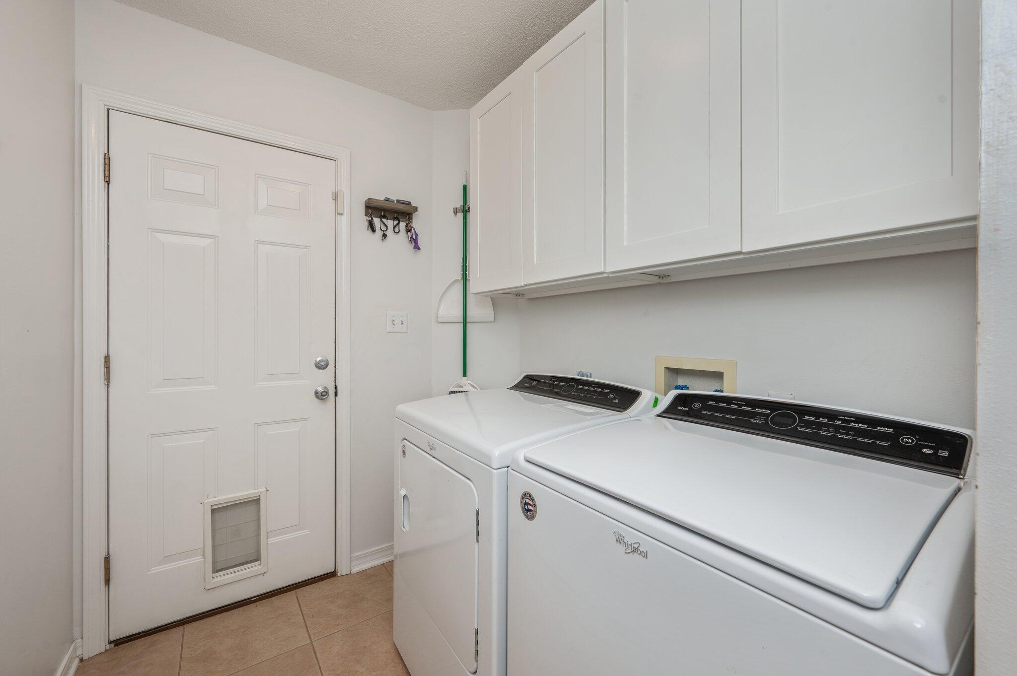 695 Randall Roberts Road Fort Walton Beach, FL 32547 - Photo 30 of 40 a utility room with dryer and washer