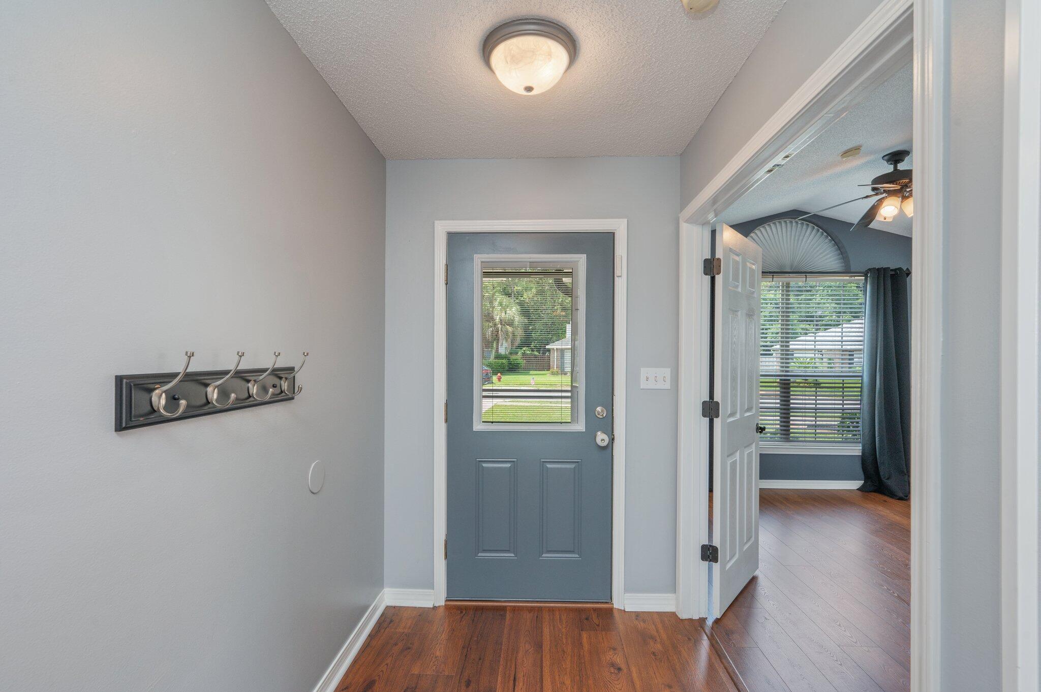 695 Randall Roberts Road Fort Walton Beach, FL 32547 - Photo 4 of 40 wooden floor in an empty room