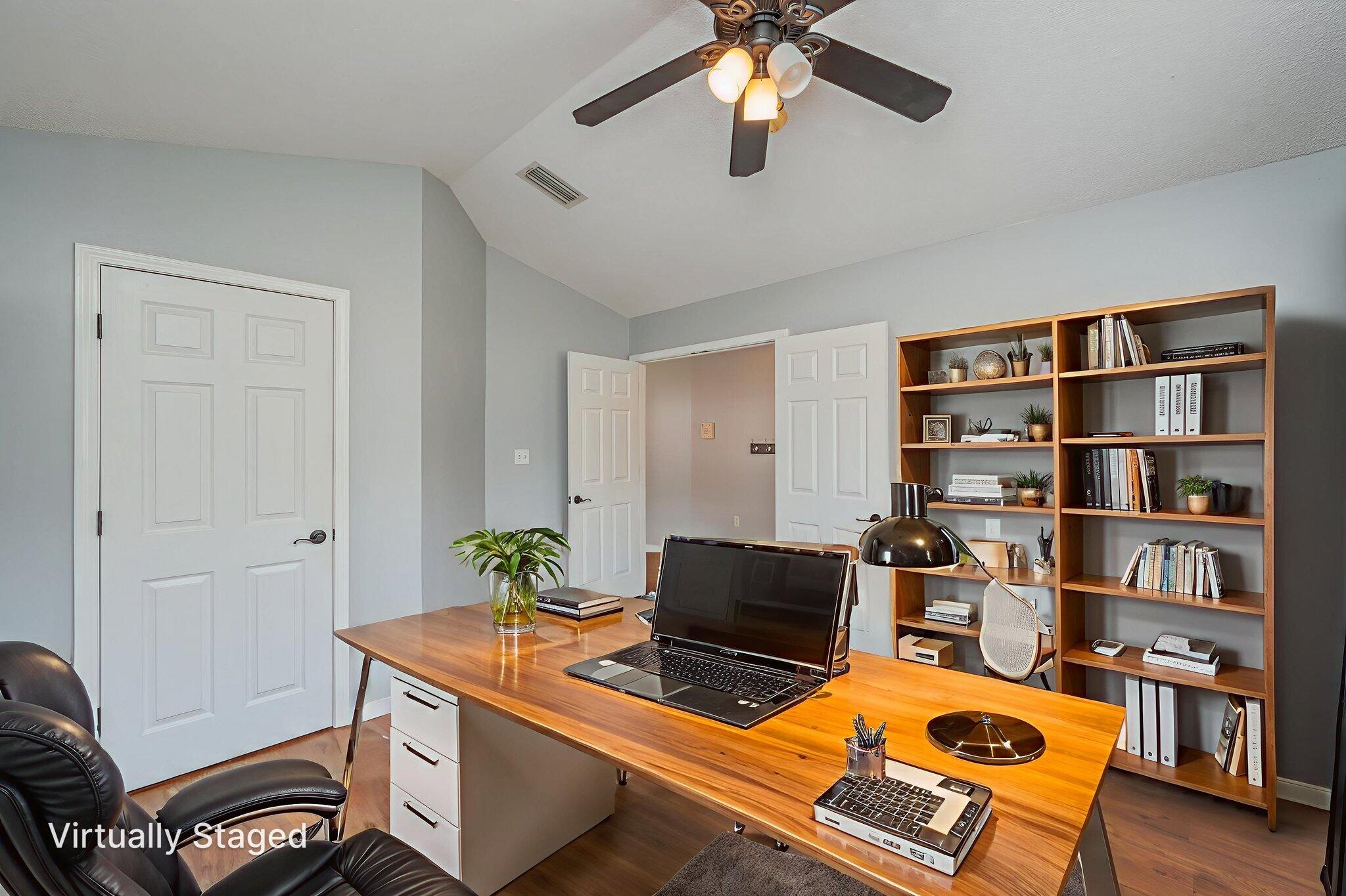 695 Randall Roberts Road Fort Walton Beach, FL 32547 - Photo 5 of 40 a workspace with furniture and bookshelf