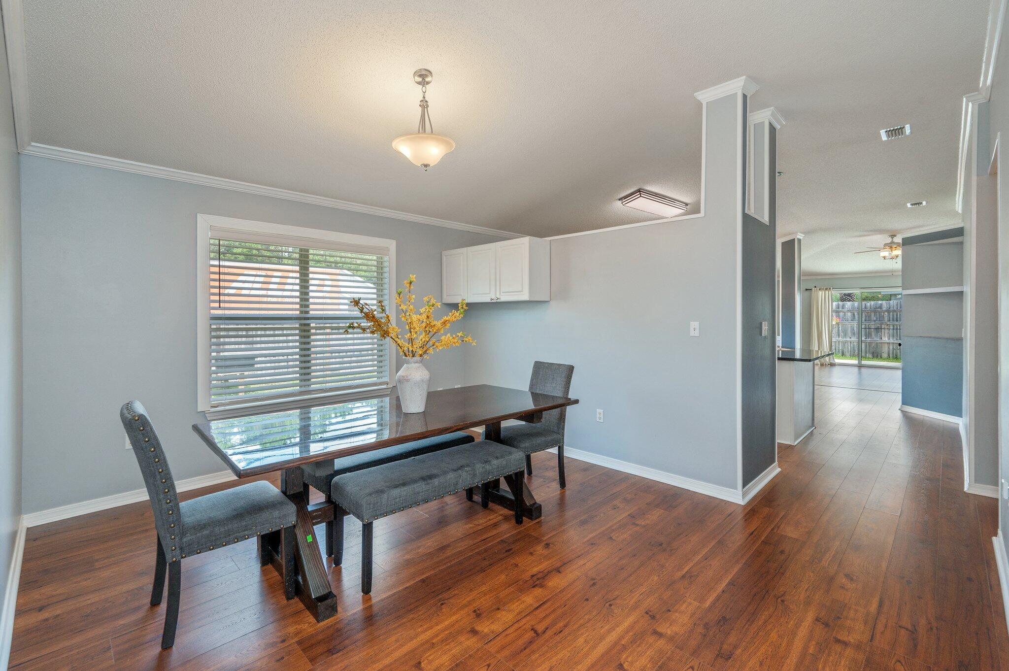 695 Randall Roberts Road Fort Walton Beach, FL 32547 - Photo 8 of 40 a view of a workspace with furniture and a window