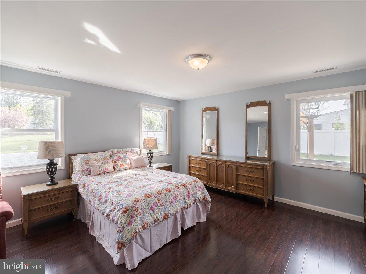 45 Shelley Road Southampton, PA 18966 - Photo 18 of 31 a bedroom with a bed wooden floor and windows