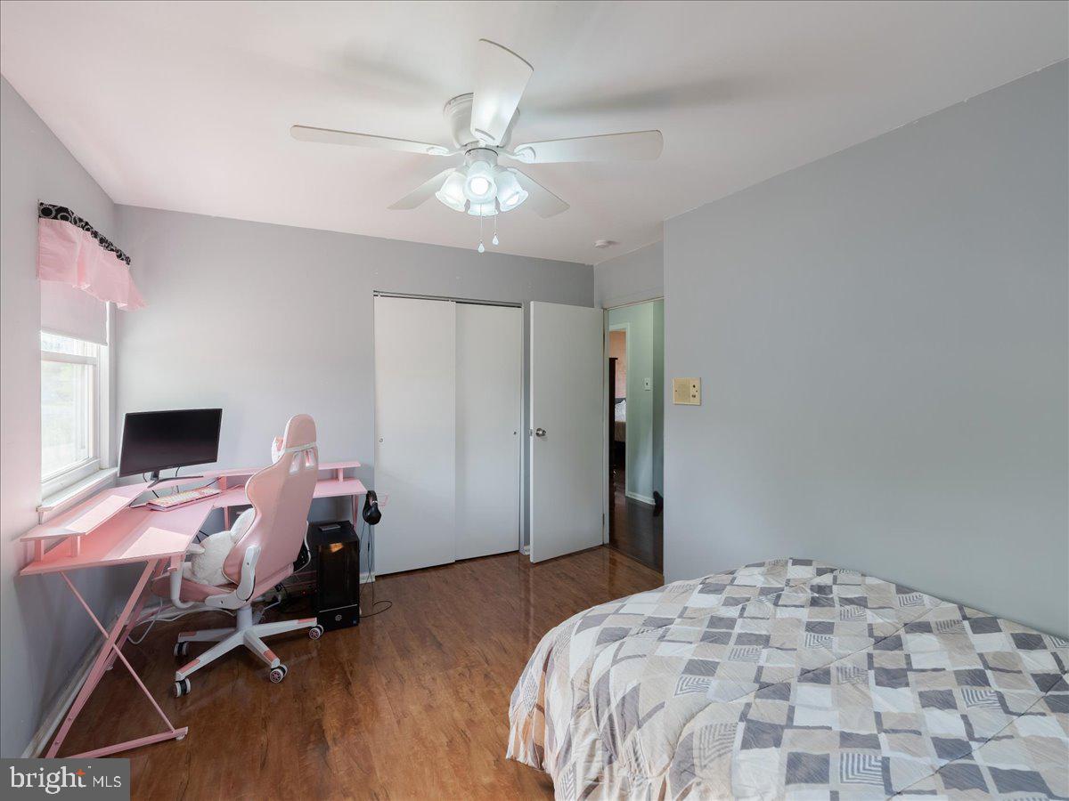 45 Shelley Road Southampton, PA 18966 - Photo 27 of 31 a bedroom with a bed and a chandelier