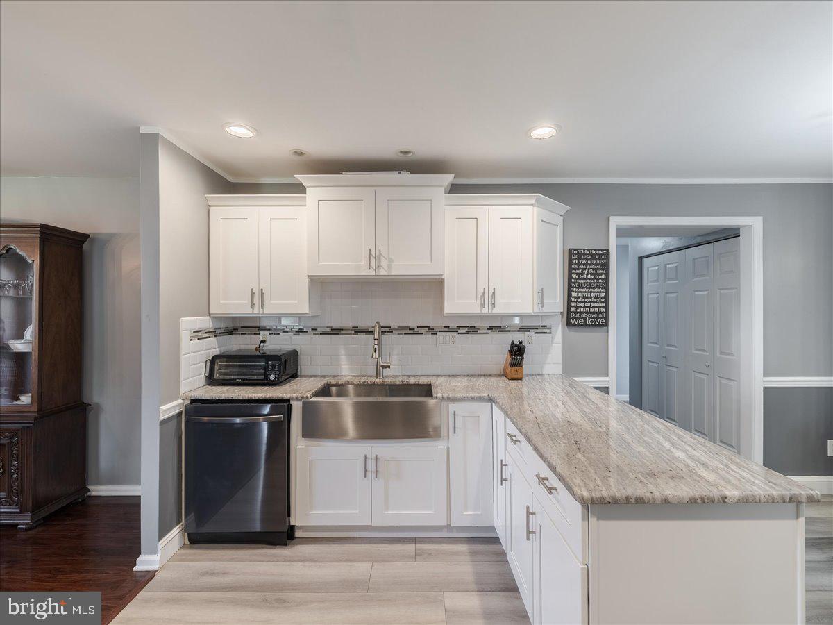 45 Shelley Road Southampton, PA 18966 - Photo 7 of 31 a kitchen with stainless steel appliances granite countertop a stove a sink and a refrigerator