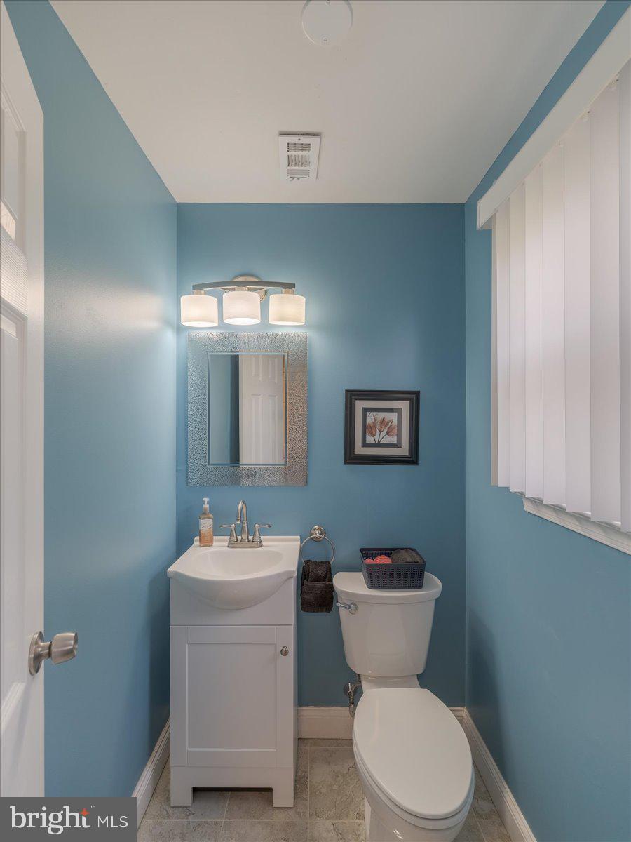 45 Shelley Road Southampton, PA 18966 - Photo 9 of 31 a bathroom with a toilet a sink and mirror