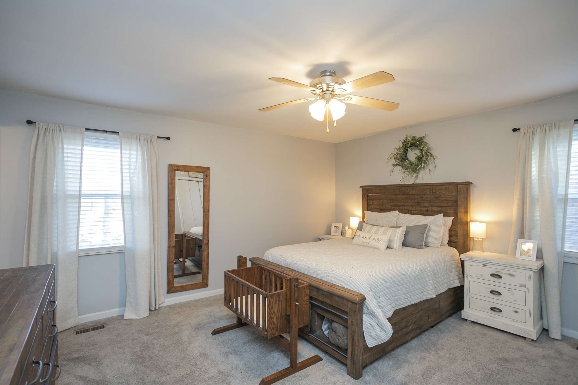 1124 Jacksons View Road Hermitage, TN 37076 - Photo 11 of 22 a bedroom with a bed and a chandelier