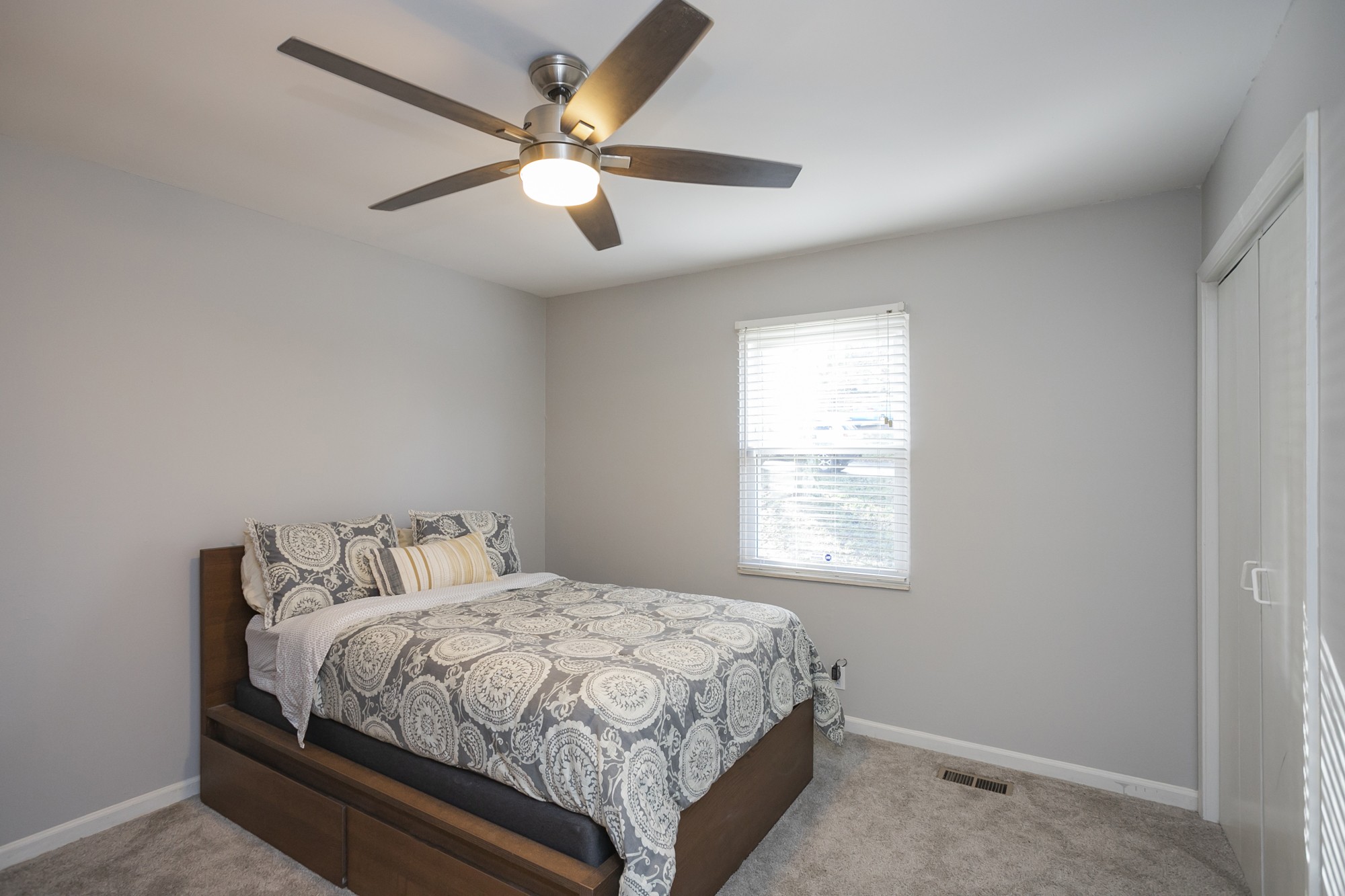 1124 Jacksons View Road Hermitage, TN 37076 - Photo 14 of 22 a bedroom with a large bed and a window